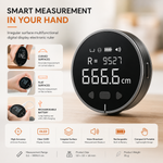 Smart digital measuring tape held in one hand showing the 1.8 inch LCD display with a clear distance reading